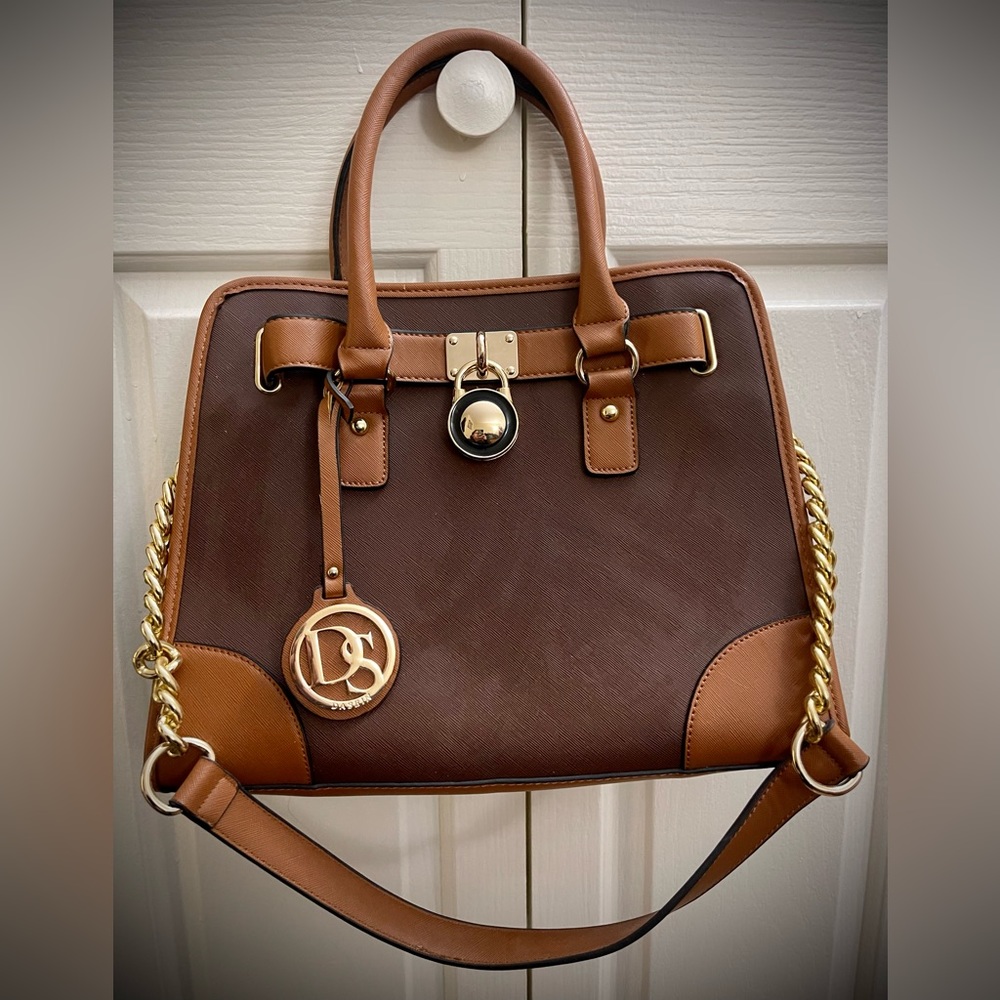 DS brand, NWOT, excellent condition, no blemishes. Lots of hardware, no tarnish